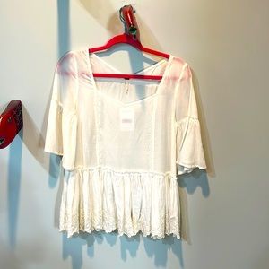 Free People white top. NWT. Size XS